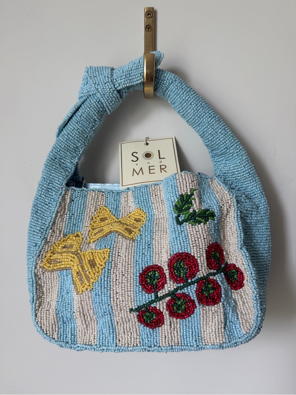 Sol & Mer Beaded pasta tomato blue striped bag